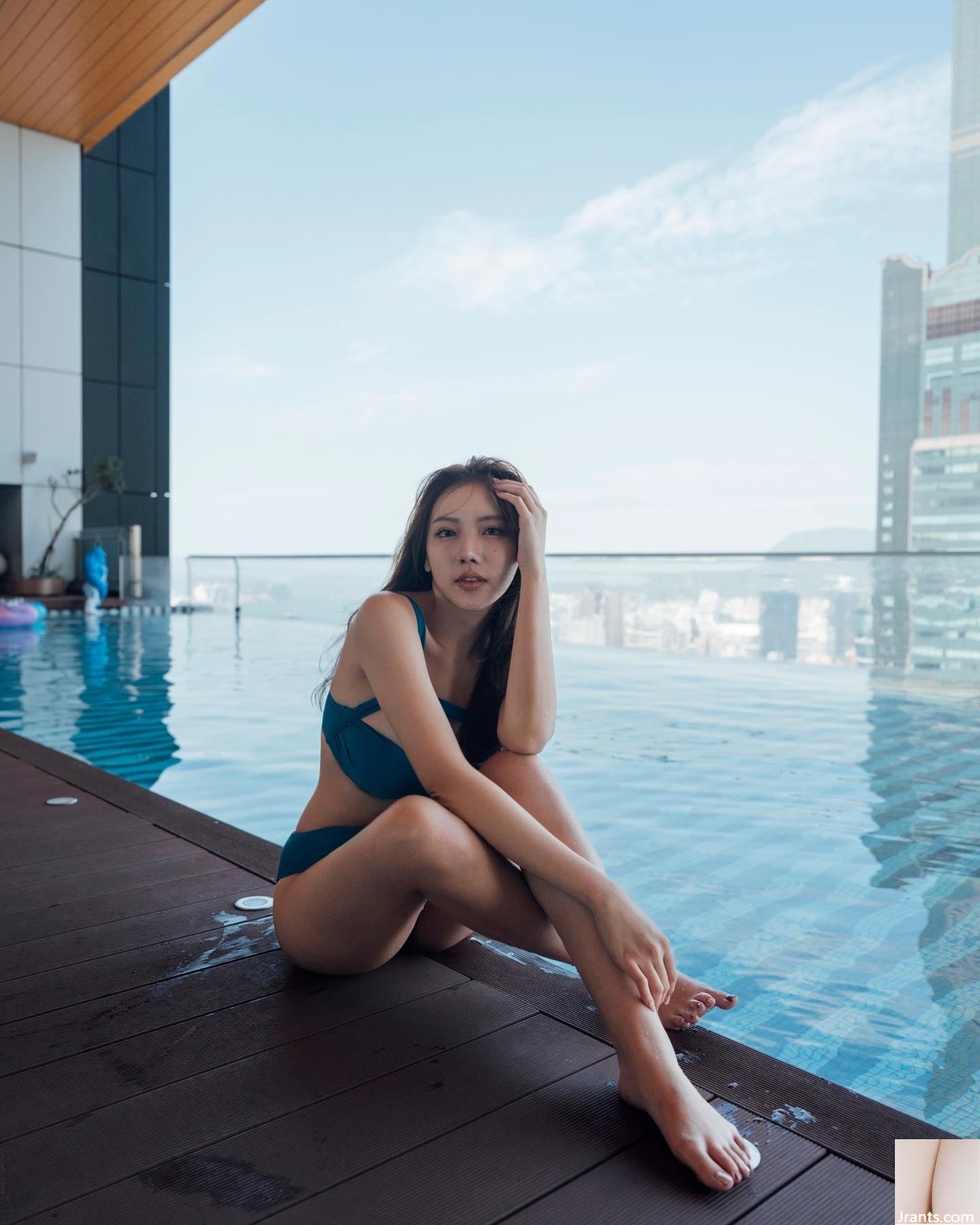 Khuôn mặt dễ thương và bộ ngực tuyết trắng của nàng tiên “Qiqi” thực sự là tâm điểm chú ý của mọi người (30P)