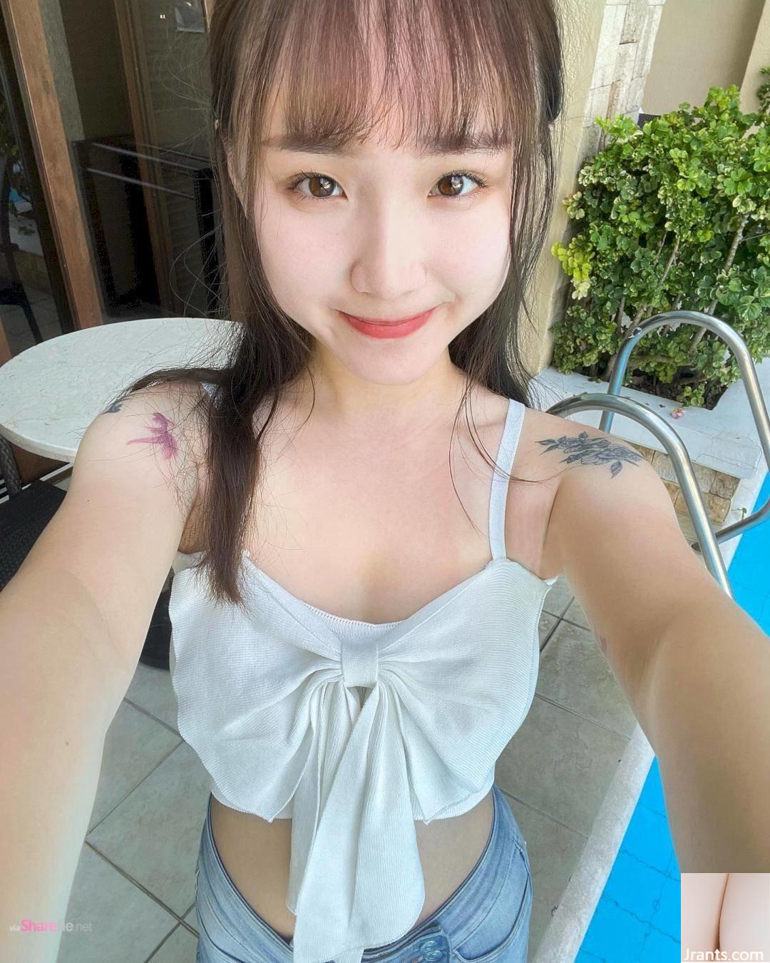 Cô gái xinh đẹp chụp ảnh tốt nghiệp trong gió lạnh ở bãi biển - Ảnh 6